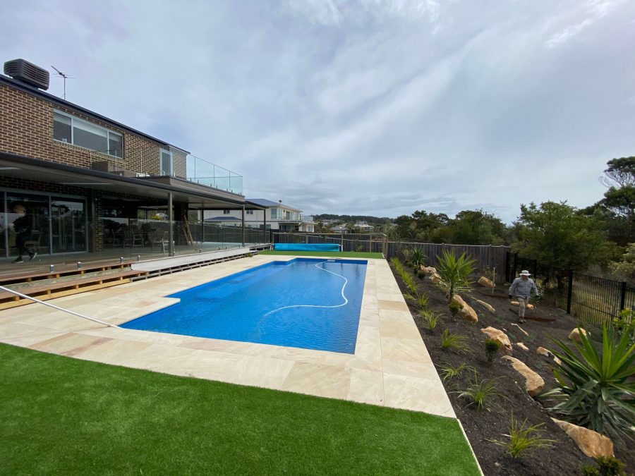 Artificial turf, rock work, plants